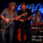 Guitarist Ashley Naylor, vocalist Gary Young, drummer Nigel Davis for Scarecrow - The John Mellencamp tribute show from Melbourne